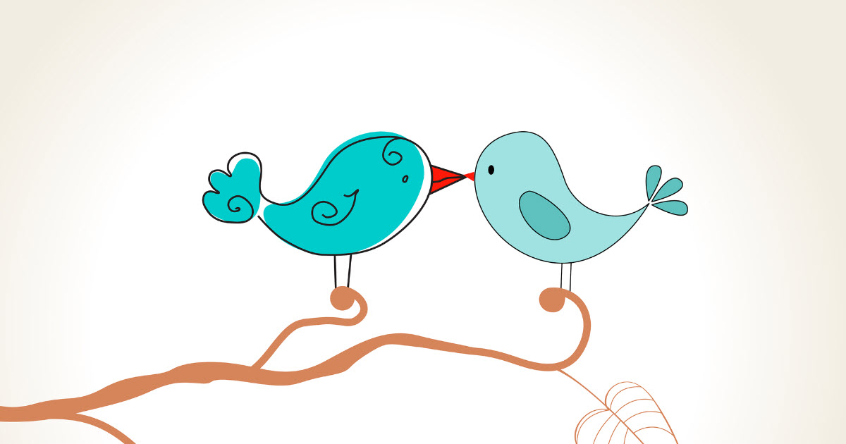 Two birds kissing on a branch in a tree.